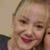 WPF Community - Eine lächelnde Frau mit blonden Haaren, Pony und rotem Lippenstift.